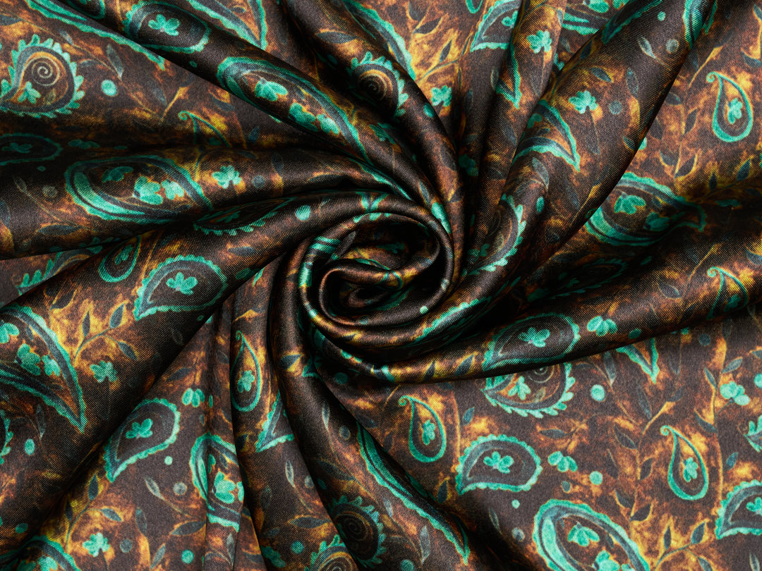 Brown gold marble background with teal paisley print satin fabric