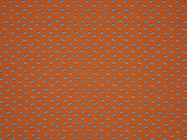 Peachskin  fabric by the yard - Orange Tribal print