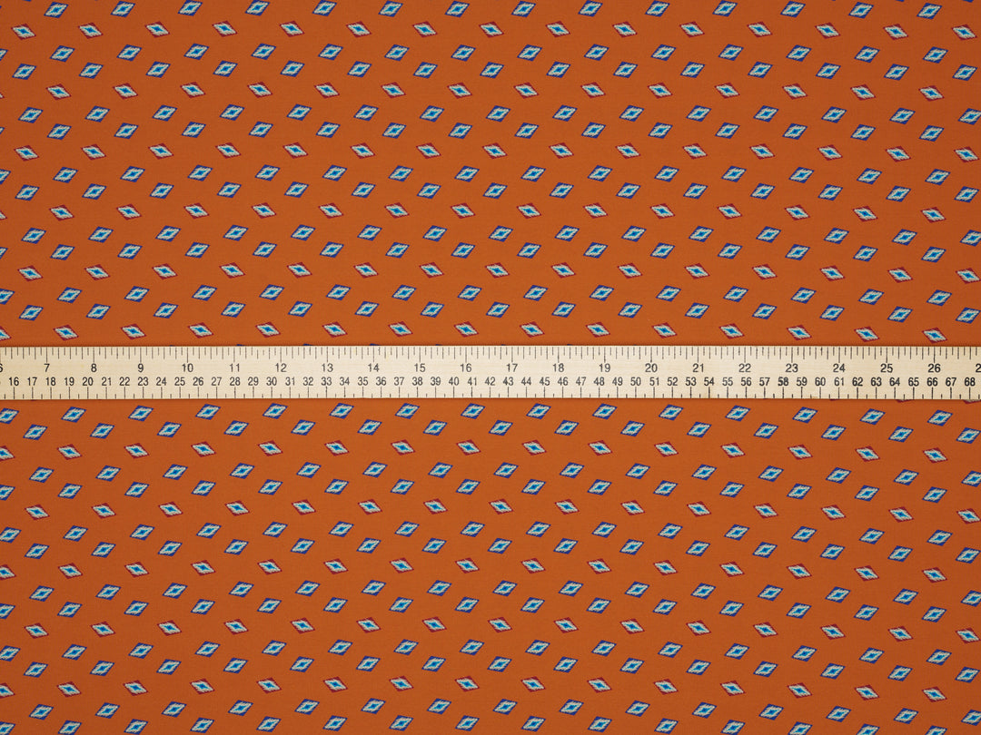 Peachskin  fabric by the yard - Orange Tribal print