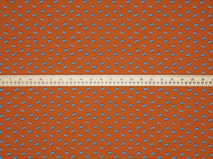 Peachskin  fabric by the yard - Orange Tribal print