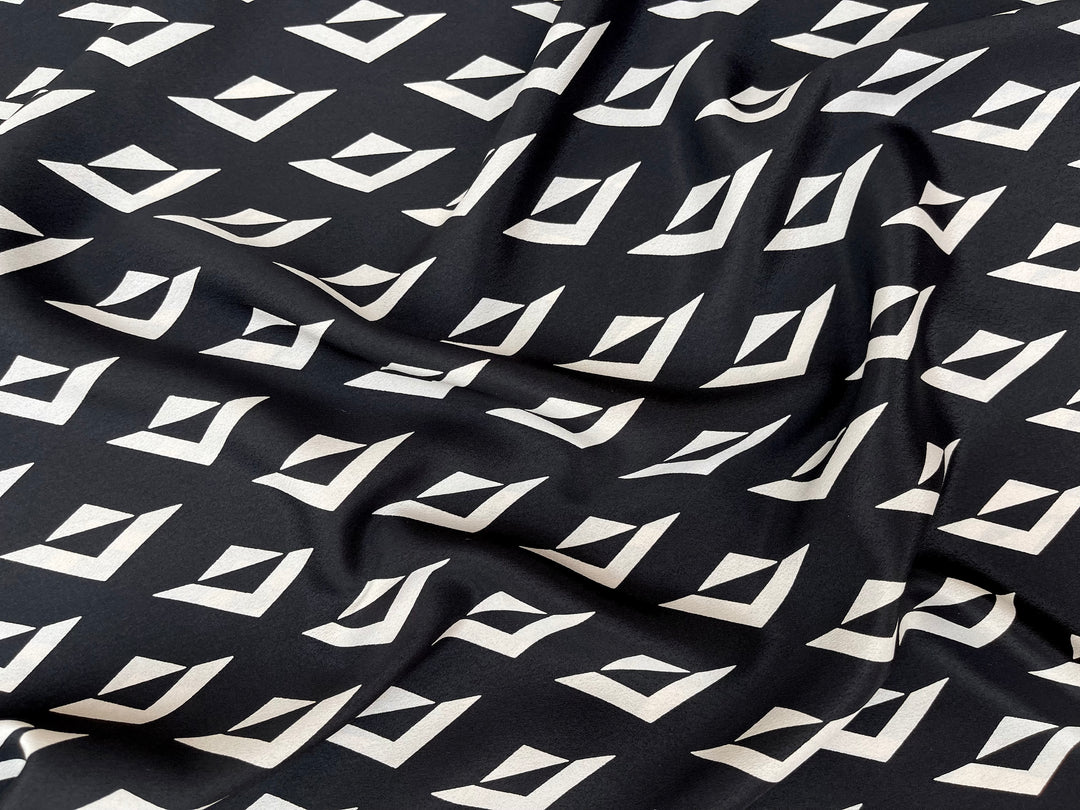 Crepe de Chine fabric by the yard - Ivory triangles on black  print