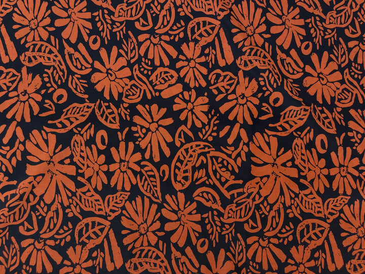 Crepe de Chine fabric by the yard - Orange paisley floral on black