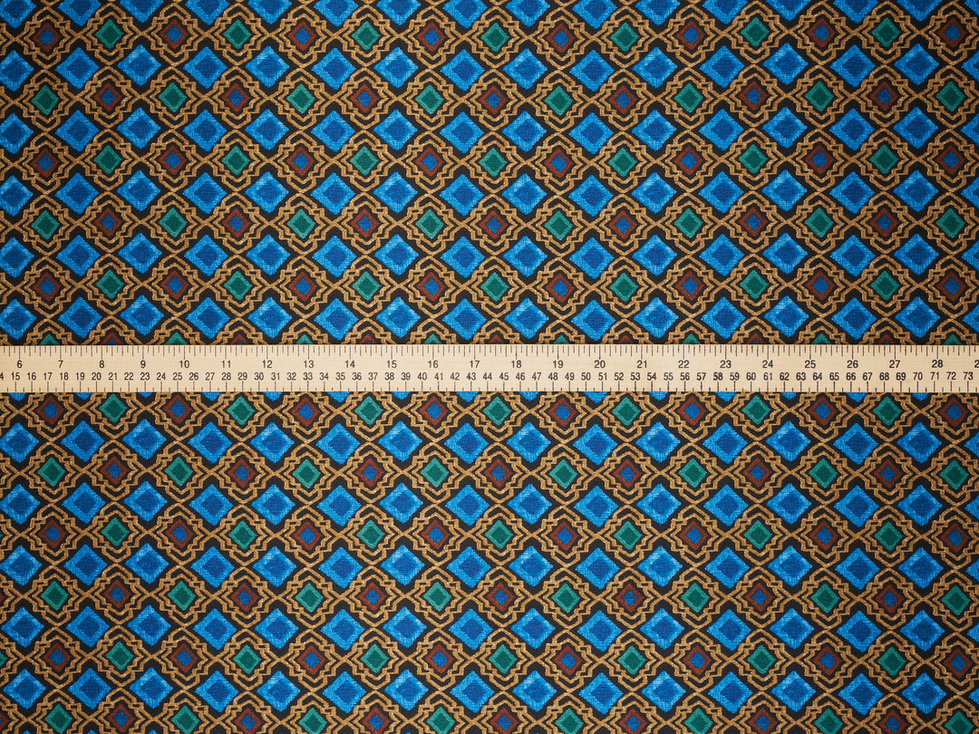 Patterned fabric with a ruler at the bottom for scale
