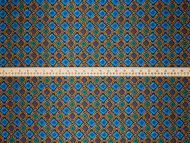 Patterned fabric with a ruler at the bottom for scale