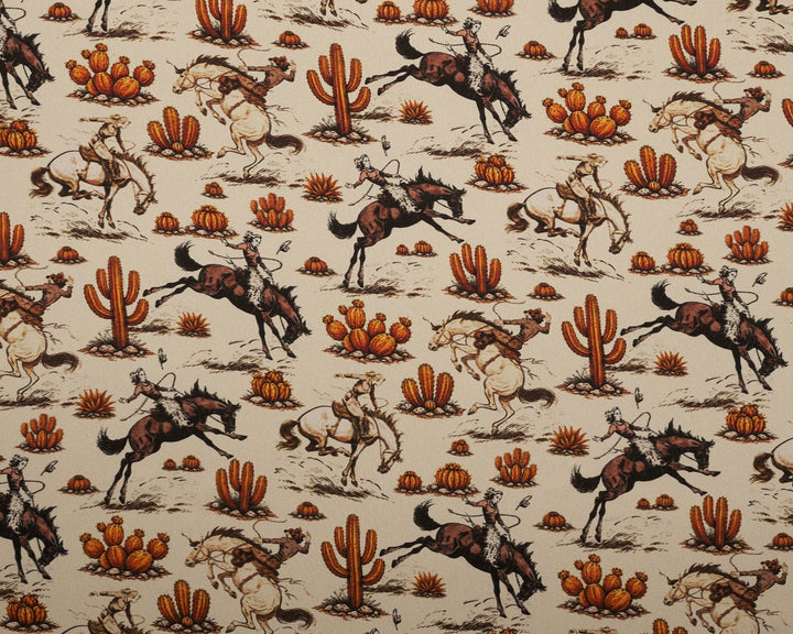 Patterned fabric with horses and cacti on a beige background