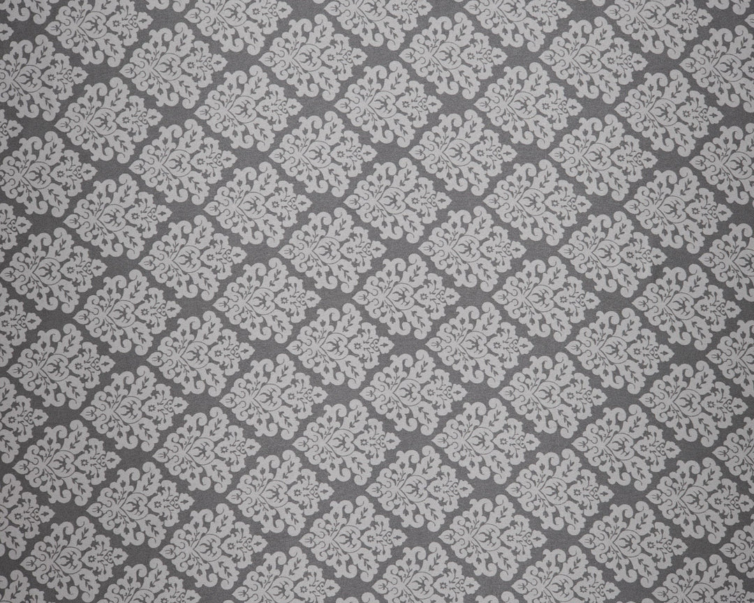 Gray and white geometric patterned fabric texture