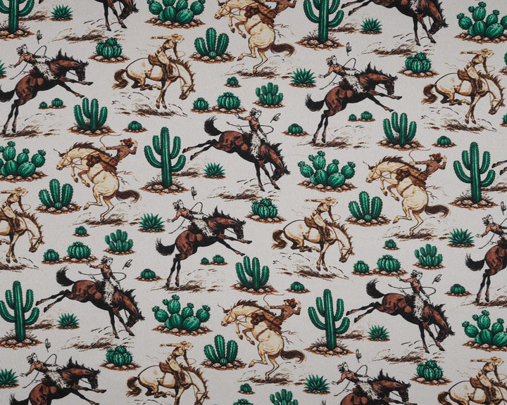 Patterned fabric with horses and cacti on a beige background
