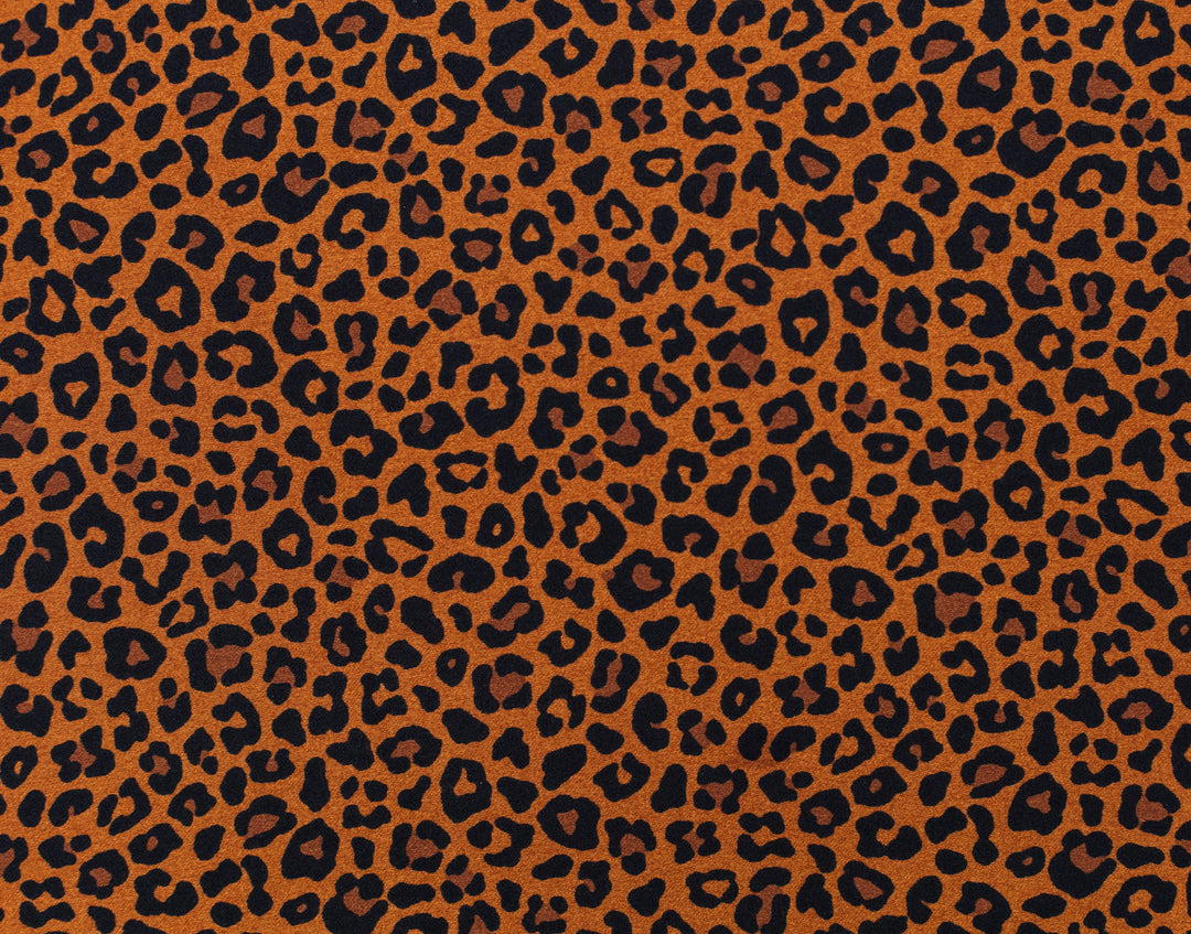 Leopard print pattern on a brown background