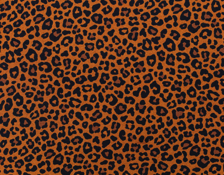 Leopard print pattern on a brown background