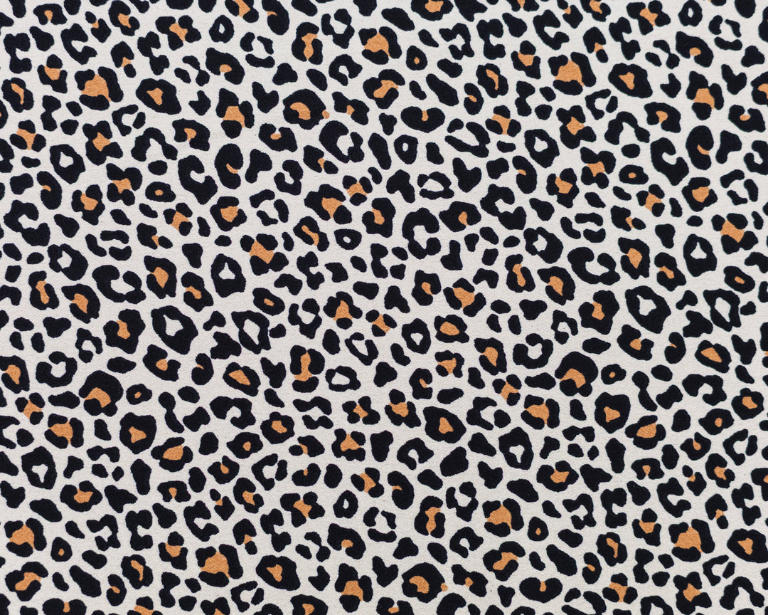 Leopard print pattern on a light background