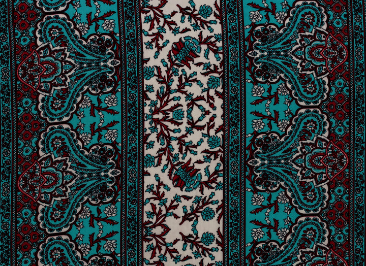 Patterned fabric with turquoise, red, and white colors.