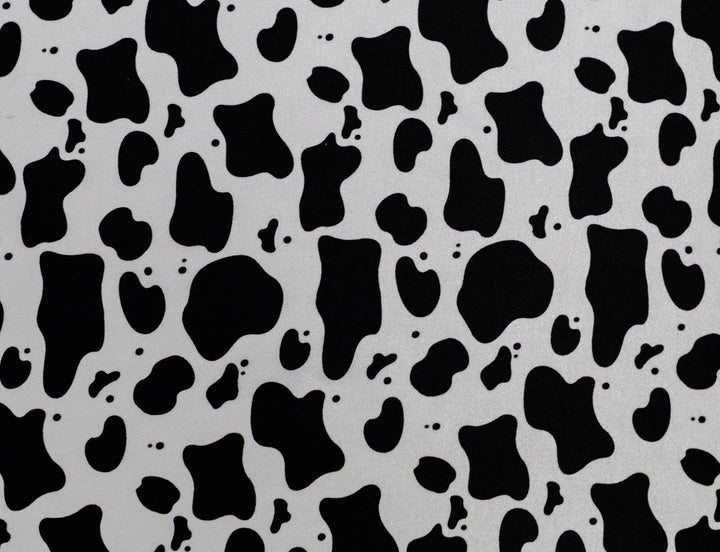 Black abstract shapes on a gray background