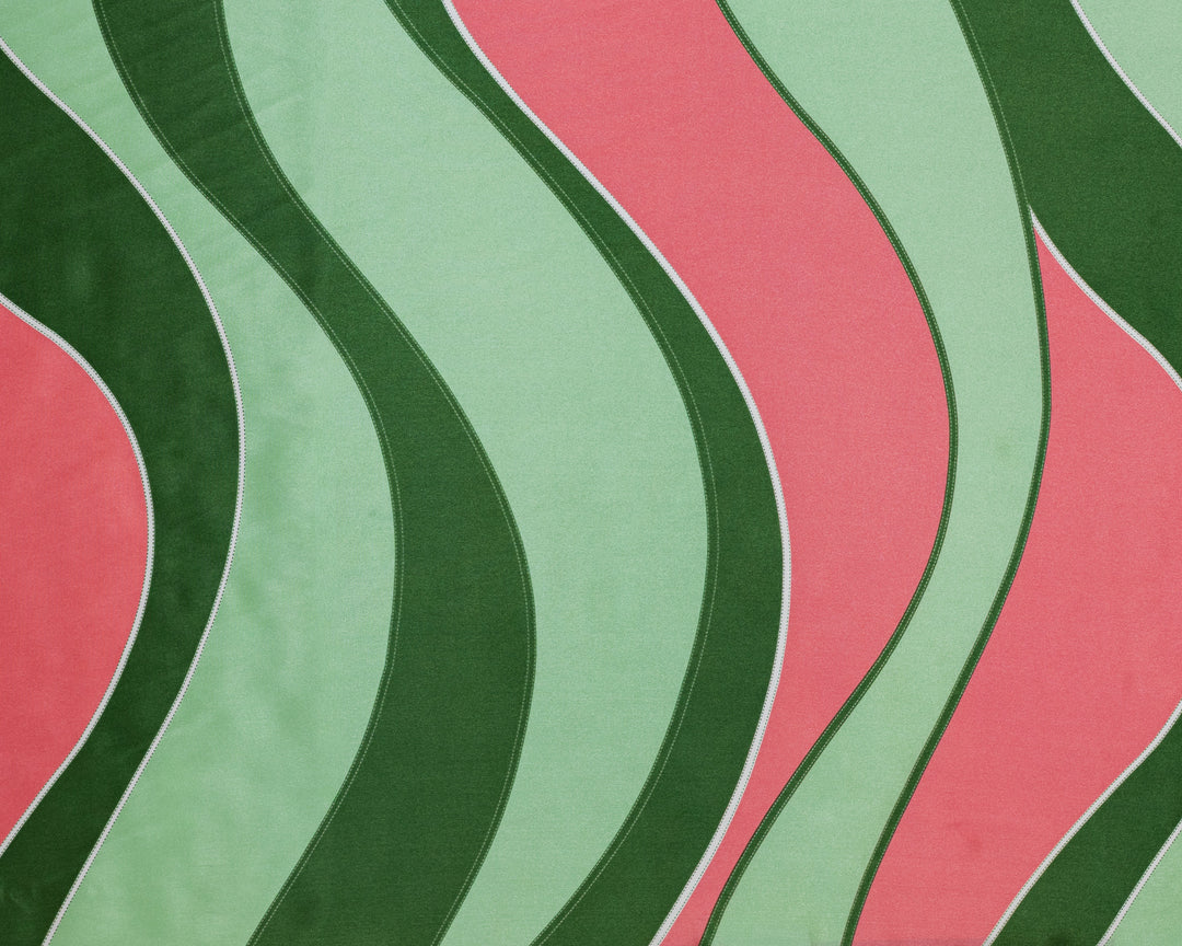 Wavy pattern with green and pink colors on a textured surface