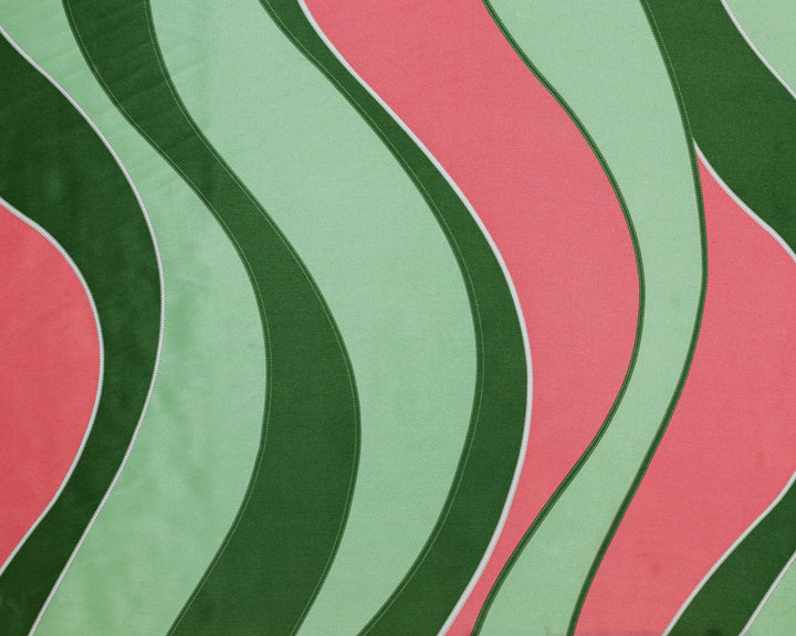 Wavy pattern with green and pink colors on a textured surface