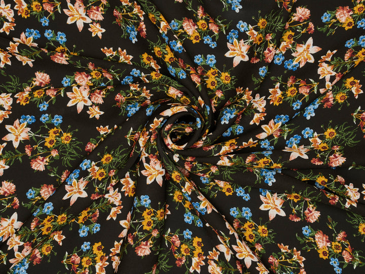 Wildflowers yellow pink blue on black background 