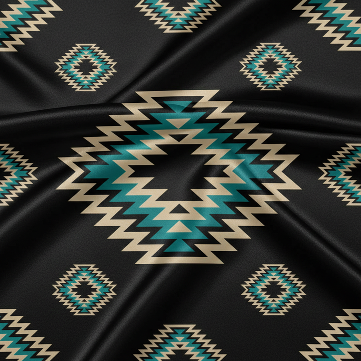 Macro detail close-up of Western Black and Teal Tribal print satin charmeuse fabric showing print and satin sheen
