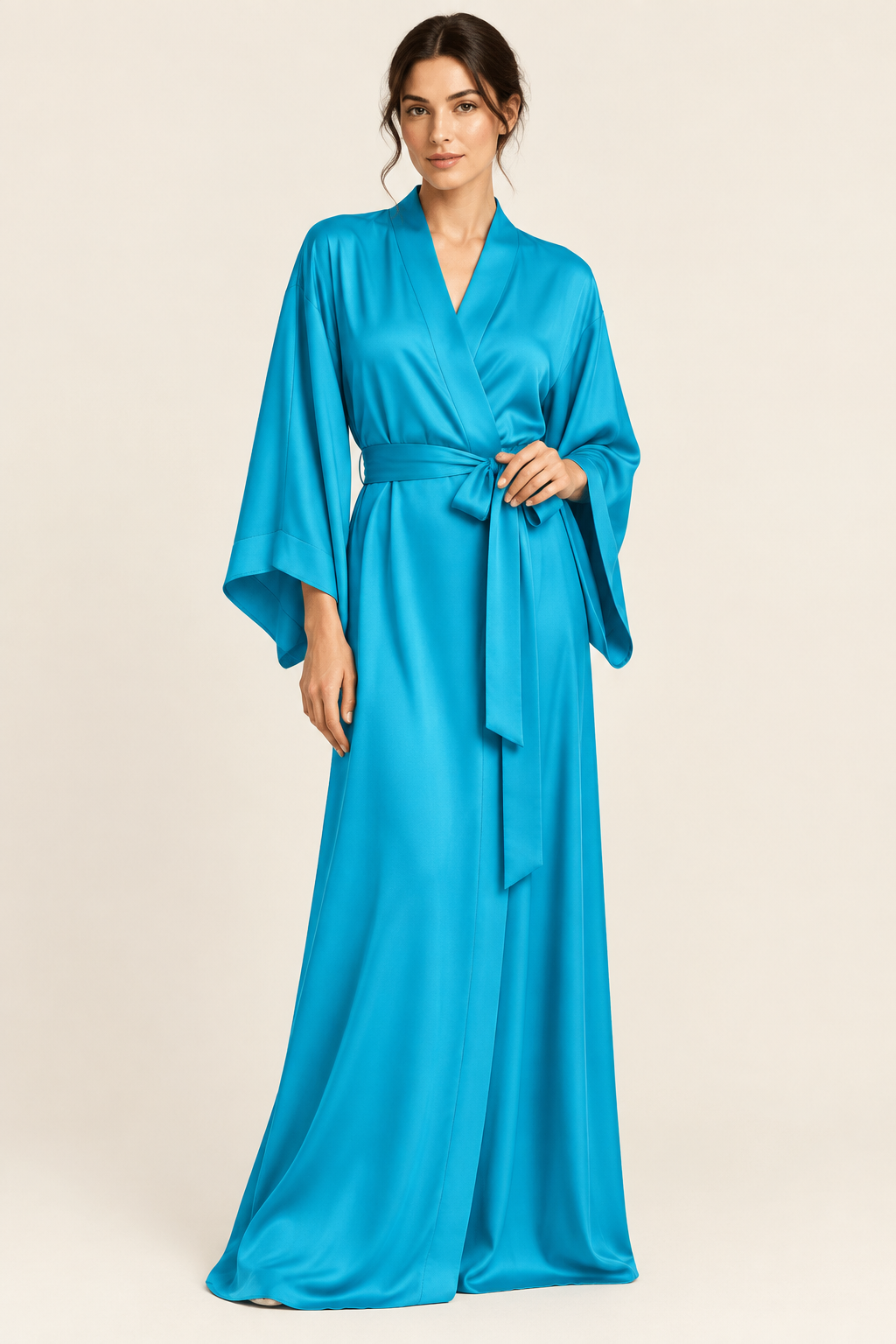 Model wearing a cyan blue silk crepe de chine kimono in a studio