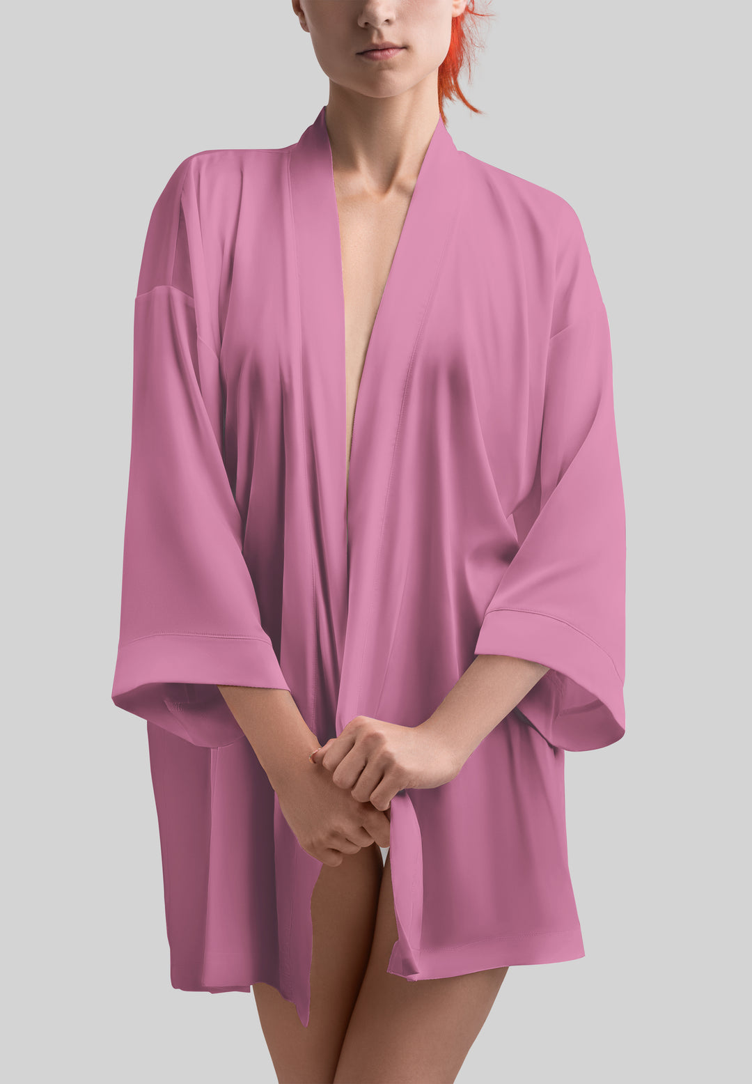 Woman wearing pink robe