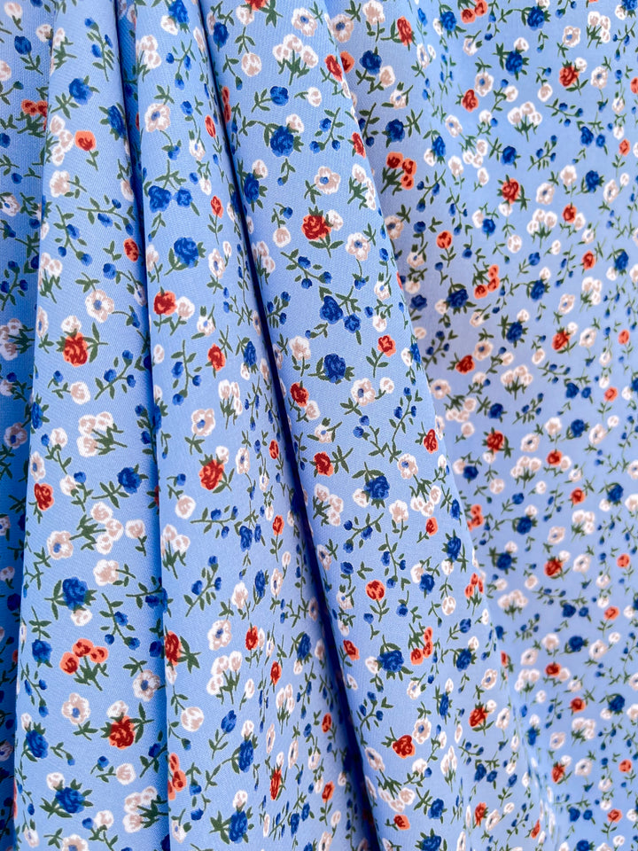 Woolpeach Floral fabric by the yard - Ligth blue red flowers print