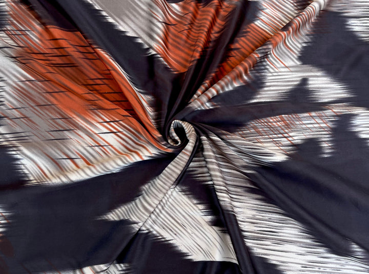 Lightweight  satin fabric by the yard - Ivory black and orange  ikat print