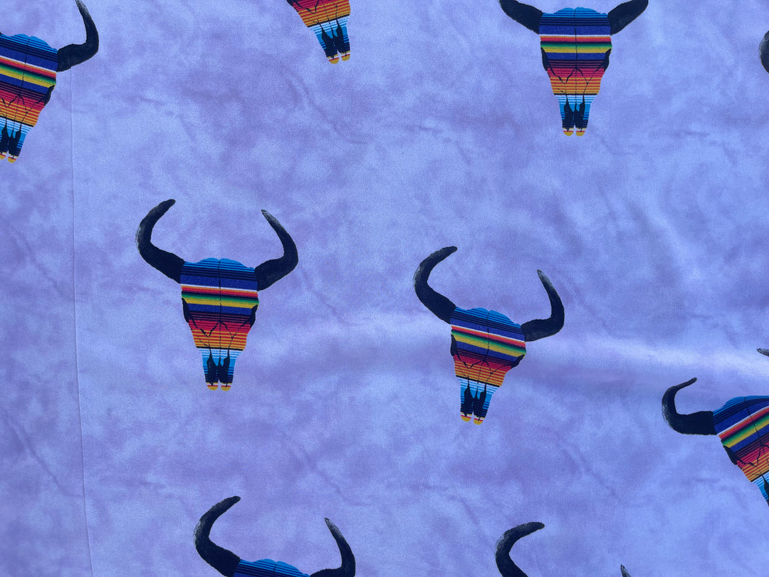 Stretch Crepe  fabric by the yard - Serape skull on lavender  tie dye western print