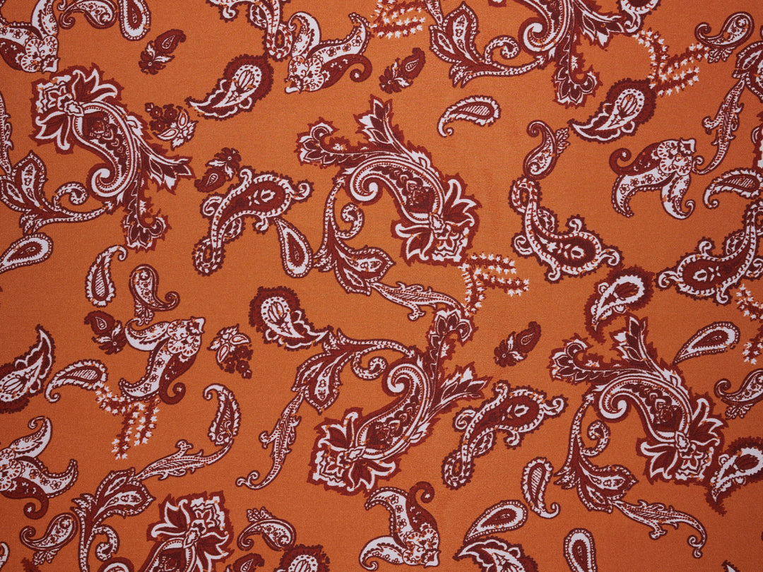 Charmeuse satin fabric by the yard - Burnt Orange distressed paisley   print