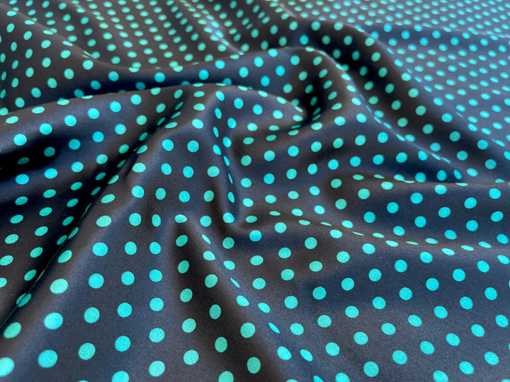 Faux silk charmeuse satin fabric by the yard - Teal polka dots on Black