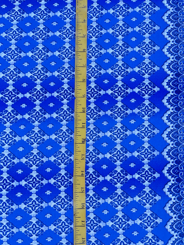 Peachskin  fabric by the yard - white blue motif tribal aztec