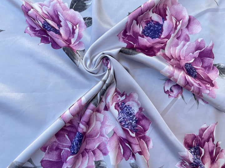 Faux silk charmeuse satin fabric by the yard - light gray with purple flowers  print