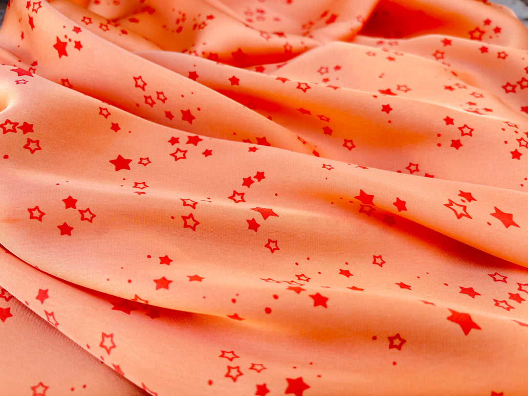 Lightweight  satin  fabric by the yard - Orange Stars  print