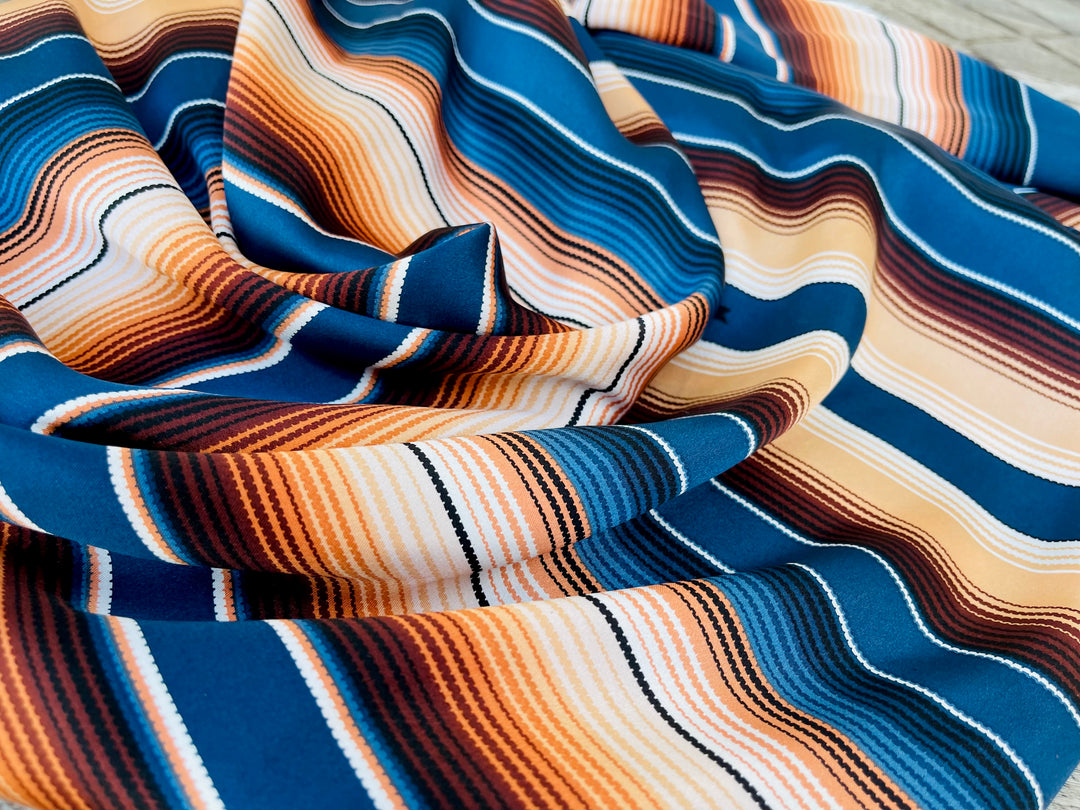 Serape boho charmeuse satin fabric by the yard - Brown blue orange