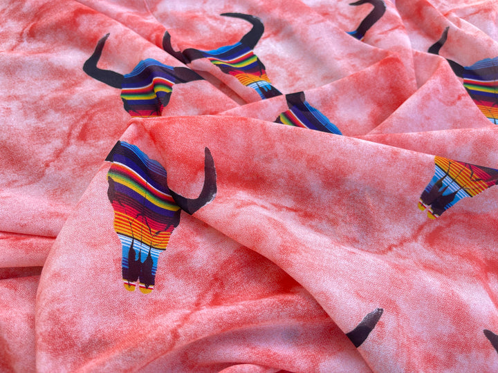 Stretch Crepe  fabric by the yard - Serape skull on coral tie dye western print