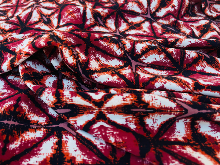 Peachskin  fabric by the yard -  Burnt red black orange  pink tribal ikat print