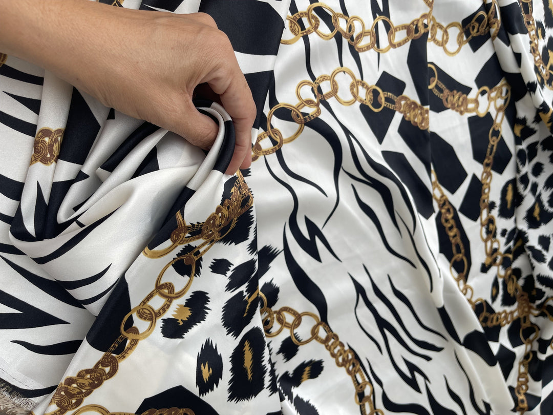 Charmeuse Satin fabric by the yard - Black and white animal with gold chains print