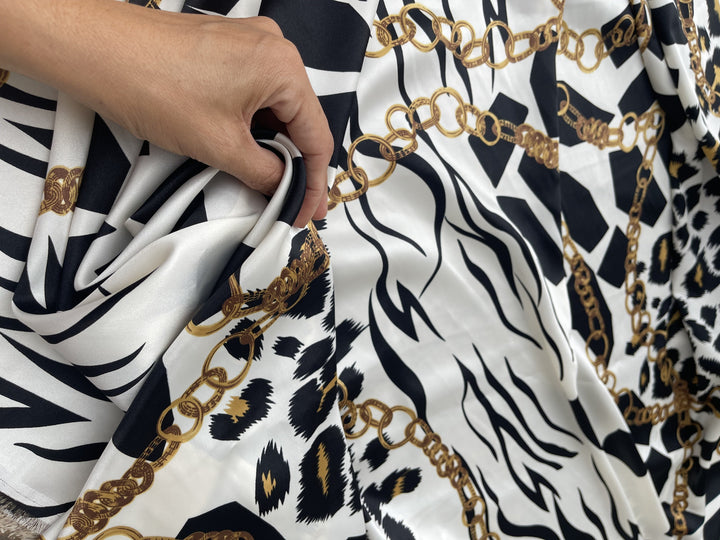 Charmeuse Satin fabric by the yard - Black and white animal with gold chains print