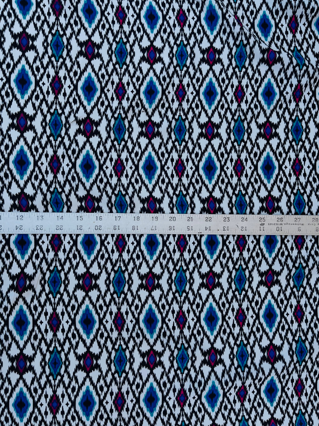 Peachskin  fabric by the yard - Black and white purple tribal aztec western  print