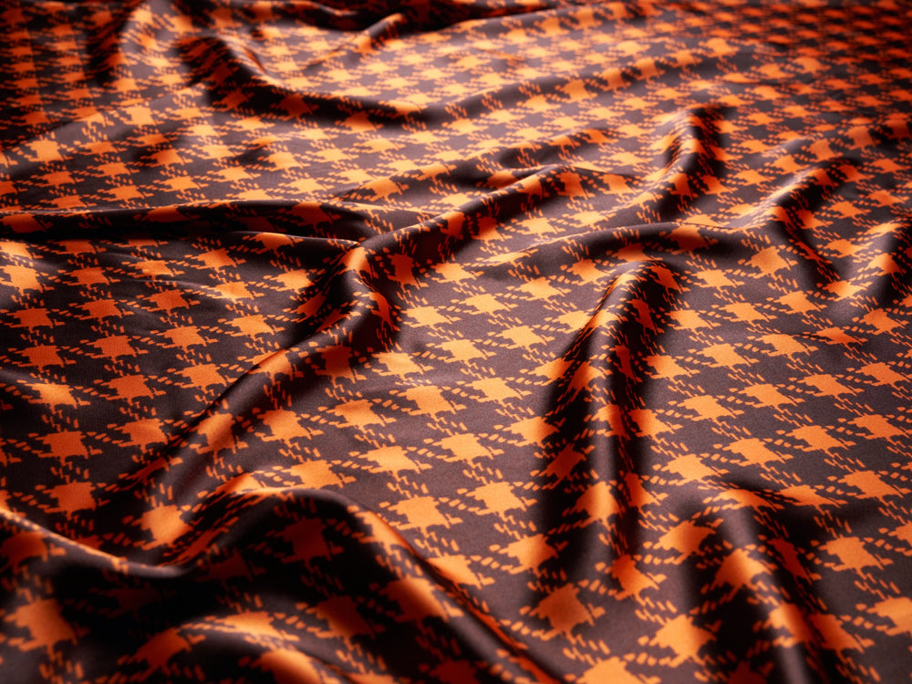 Brown and burnt orange hounds tooth print fabric