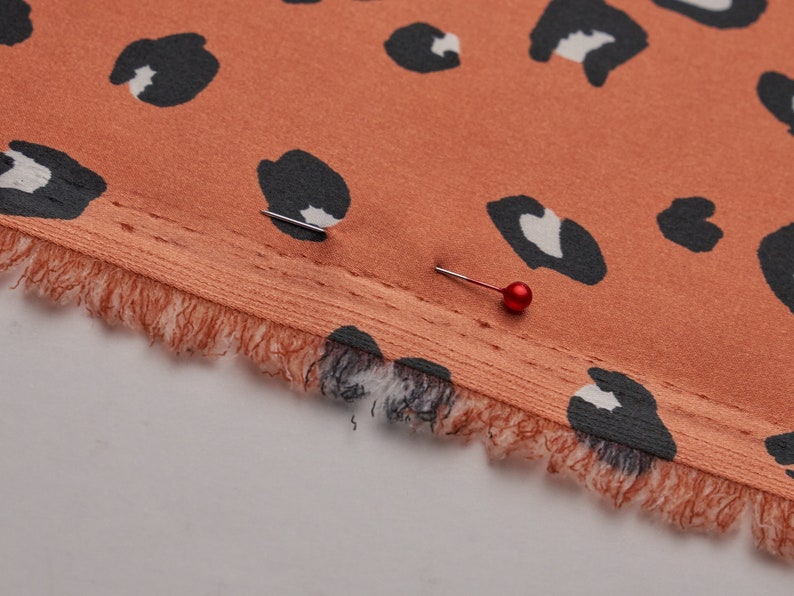 Faux silk cheetah satin fabric by the yard