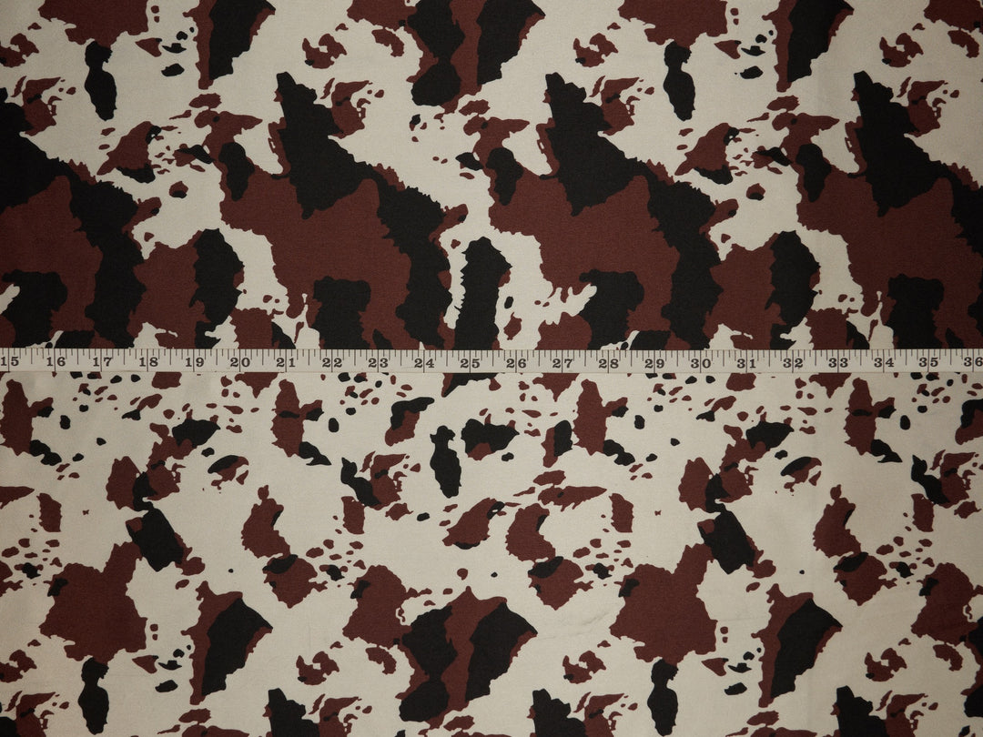 Charmeuse satin fabric by the yard - Black burgundy off white cow animal print