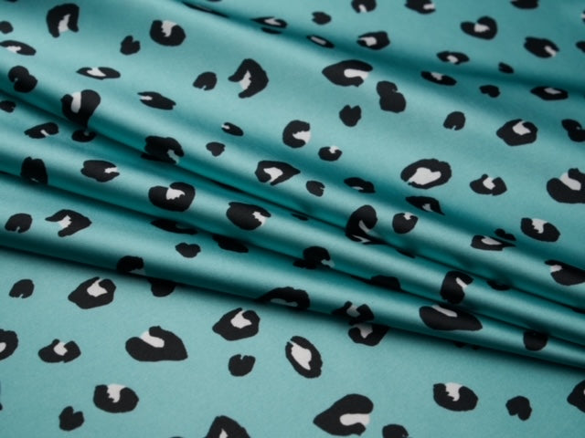 Faux silk cheetah satin fabric by the yard